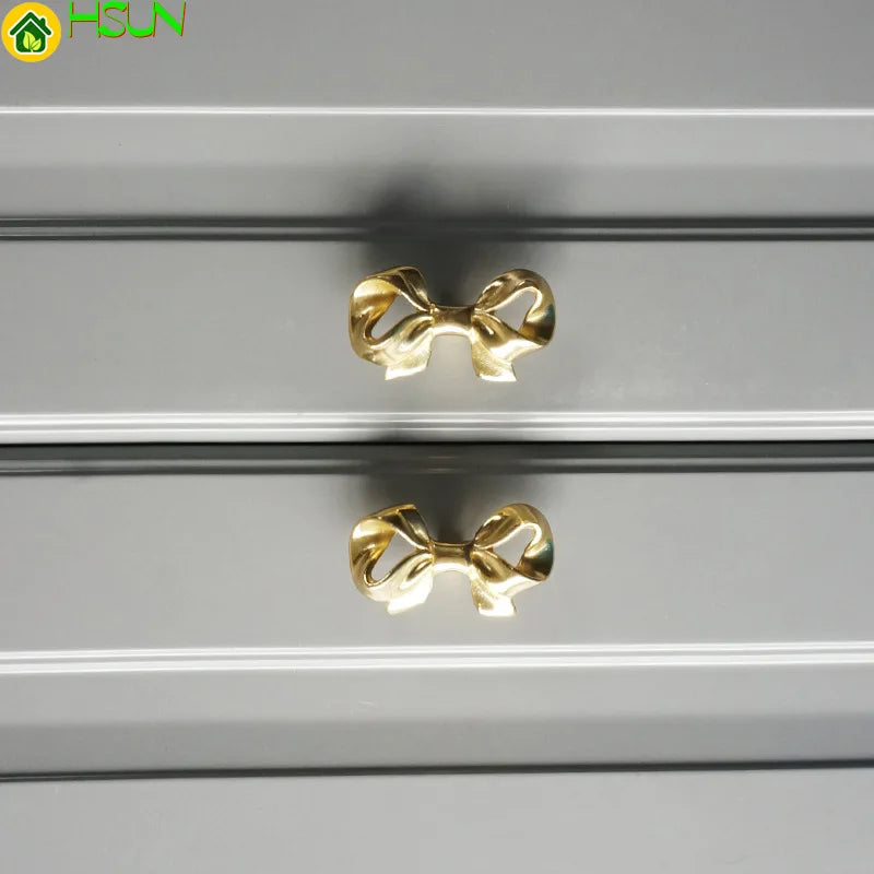 Bowknot Brass Door Handles and Knob pulls.