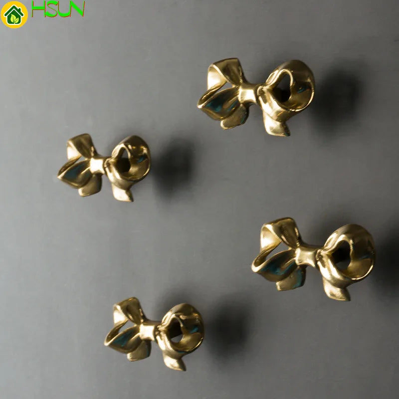 Bowknot Brass Door Handles and Knob pulls.